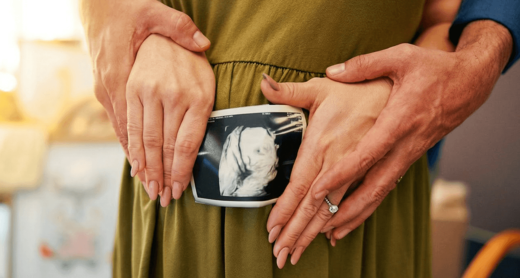 Couple holding ultrasound photo together alter a Fertility treatment process